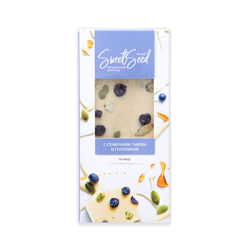 ШОКОЛАД БЕЛЫЙ НА МЕДУ С ГОЛУБИКОЙ И СЕМЕНАМИ ТЫКВЫ 40 ГР